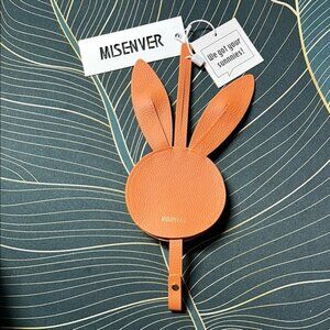 We got your sunnies Orange Bunny Ear bag charm & sunglass carrier by misenver